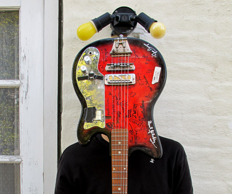 Han-earl Park and the $100 guitar (photography by Scott Friedlander, copyright 2012)